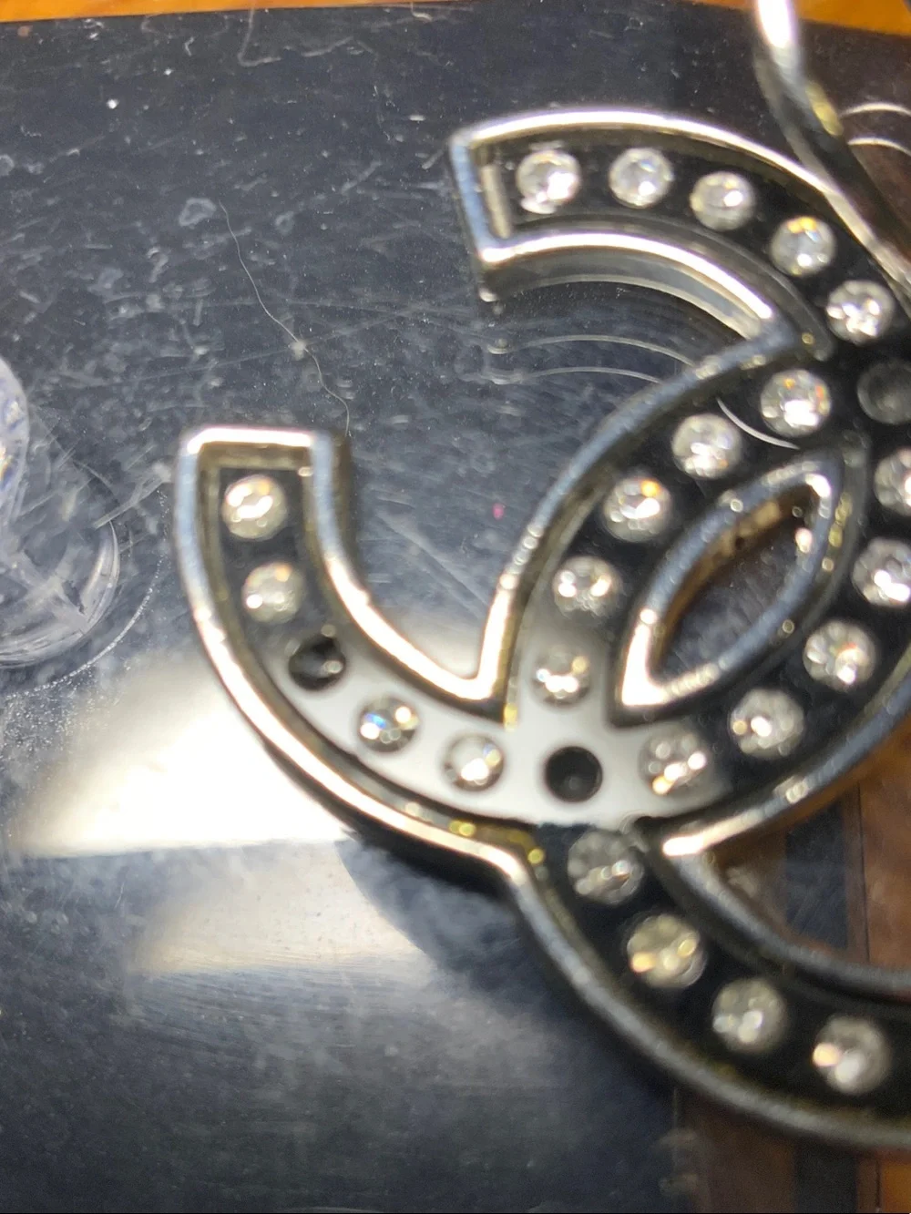 Chanel earrings￼ silver tone